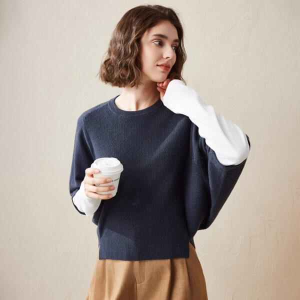 Step into effortless style and comfort with our Elegant Loose Batwing Sleeve Sweater. Crafted from a soft and cozy knit