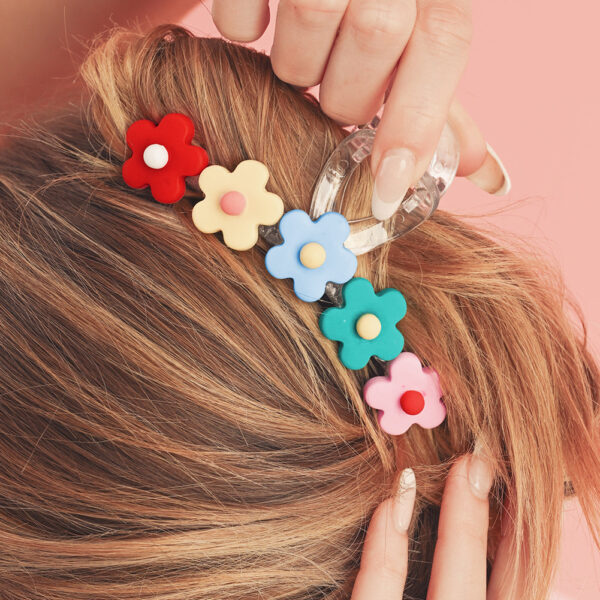 This trendy hair claw is selling like hotcakes! Bursting with bright and vibrant flowers