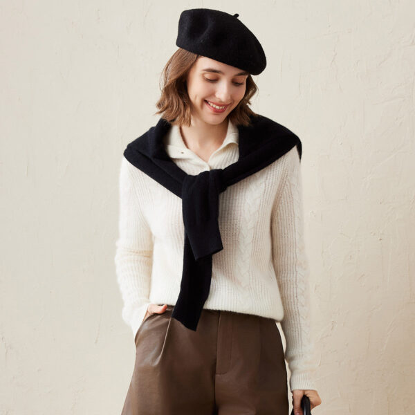 This Cable Knit Collared Sweater with Button Neck offers a stylish yet cozy look for the colder months. Designed with an elegant cable knit pattern