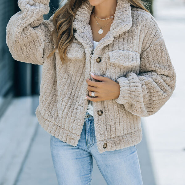 Stay toasty all winter long with this plush fleece button up jacket! Made from cozy
