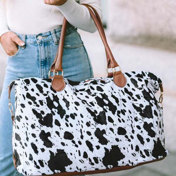 Size Chart (CM)Let your wild side show with this animal spot print tote bag. Made from durable PU leather