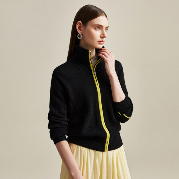Step up your casual style with our Women's Contrast Piping Zip-Up Cashmere Cardigan. This cardigan combines the luxurious feel of cashmere with a modern