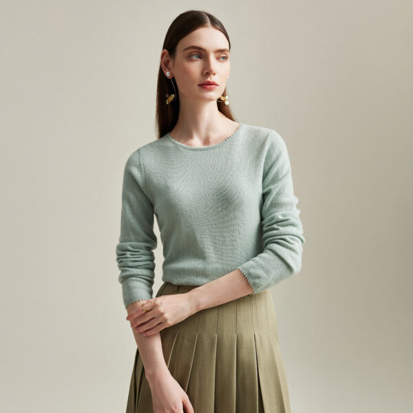 Elevate your wardrobe with this elegant and versatile soft knit pullover sweater. Designed for the modern woman