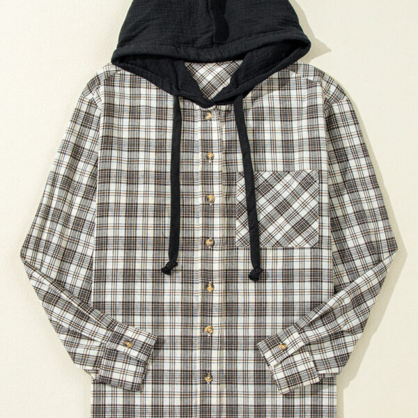  The shacket showcases a blend of classic design and a loose