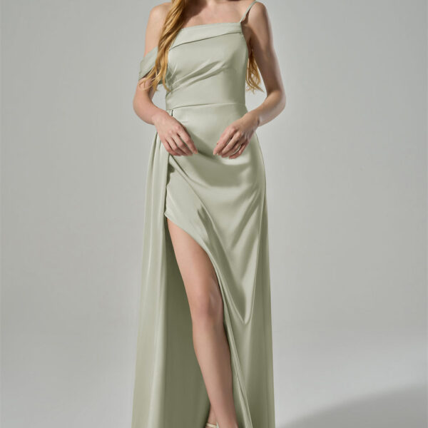 while the high slit on the skirt adds a touch of allure. The back of the dress showcases a simple yet sophistic