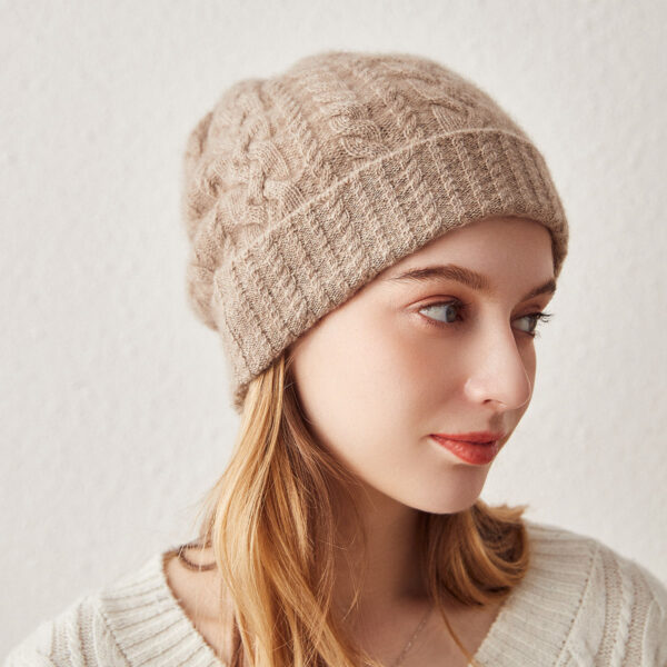 Elevate your winter wardrobe with our Luxurious Cable Knit Cashmere Beanie. Crafted from the finest cashmere