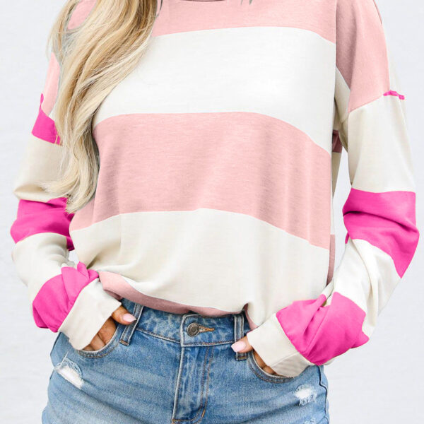 This chill top brings both comfort and style to your wardrobe. Its eye-catching stripes add a playful and contemporary touch. A cool drop shoulder design gives a laid-back and fashionable vibe. Keep warm and switch up your style with its long sleeves.