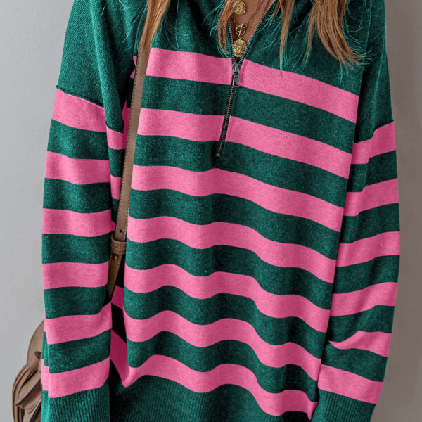  Get ready to rock your style with this oversized sweater that's stylish and oh-so-cozy. With a classic collar and chic striped design