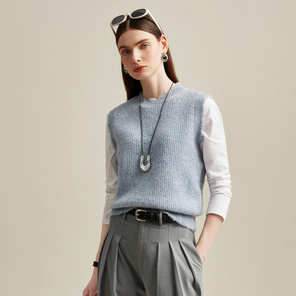 Elevate your wardrobe with this chic Textured Knit Sweater Vest