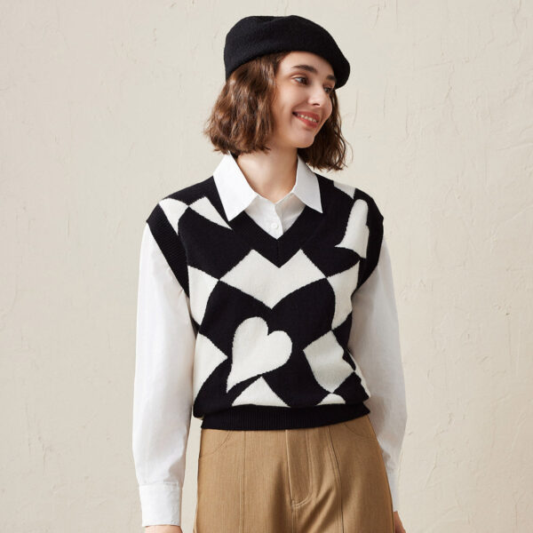 Elevate your wardrobe with this striking vintage-inspired knitted vest