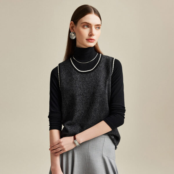 Stay effortlessly chic with this Knit Vest with Contrast Trim. Made from soft cahsmere
