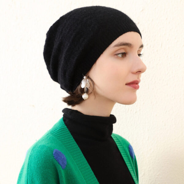 Stay warm and stylish with our Luxurious Cashmere Knit Beanie. Crafted from the finest cashmere