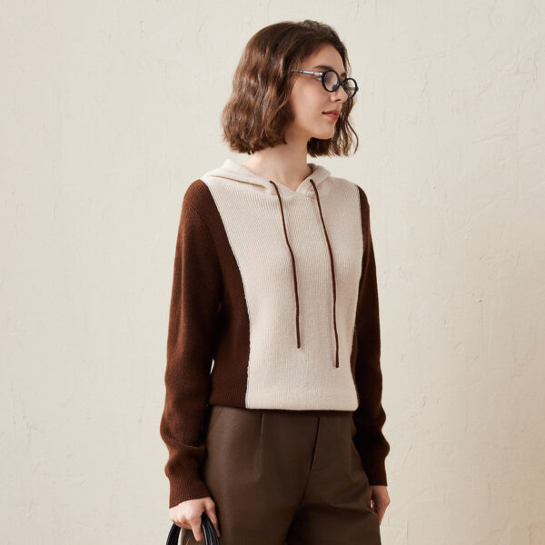 This Two Tone Casual Knit Hoodie is a perfect blend of style and comfort. Made with soft