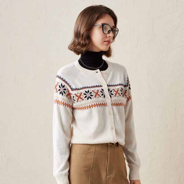 Step into winter with elegance and warmth with this Nordic Inspired Cashmere Cardigan. Featuring an intricate Fair Isle pattern across the chest
