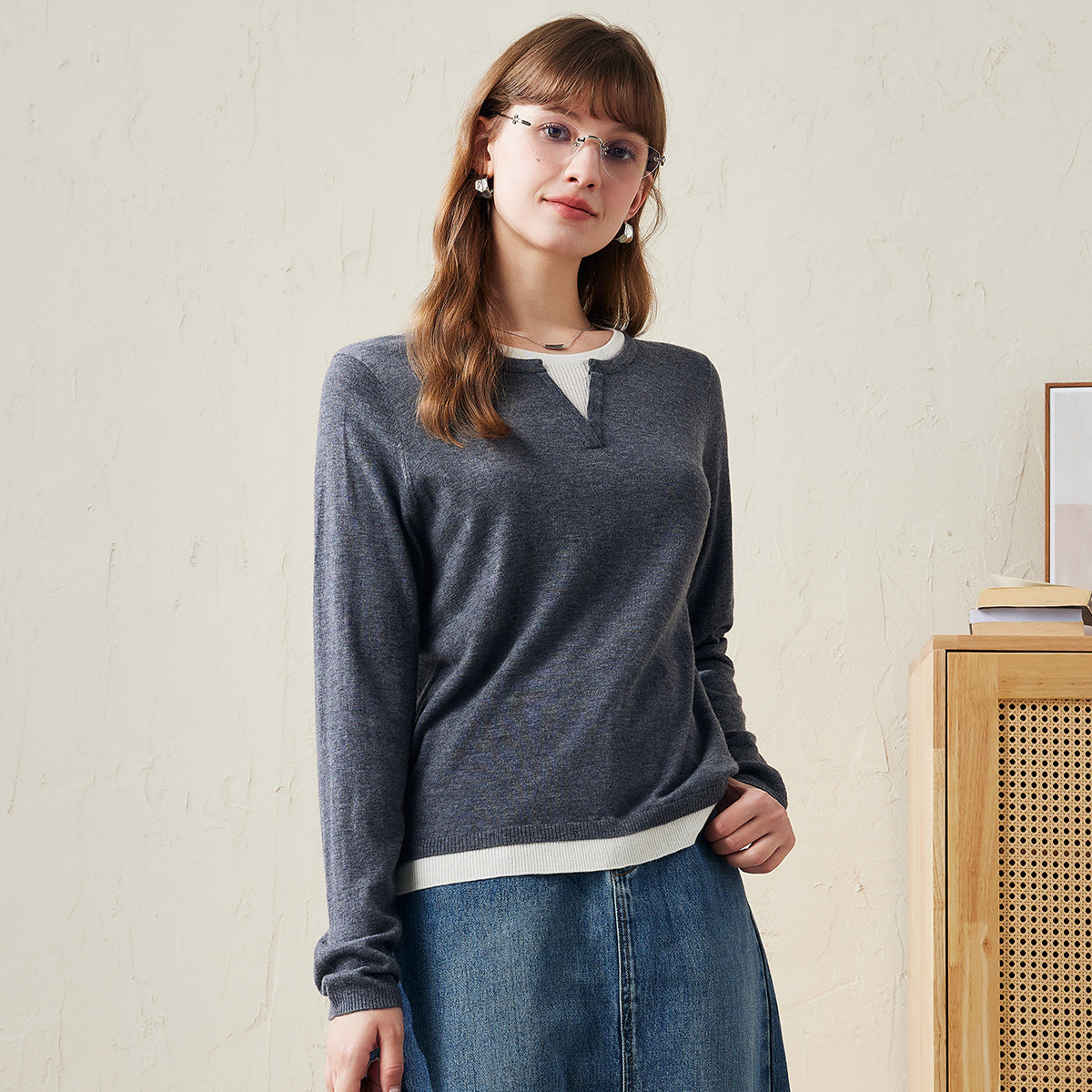 Elevate your everyday wardrobe with our Women's Casual Layered Look Pullover Sweater. This versatile sweater features a chic layered look that effortlessly combines comfort and style. The soft