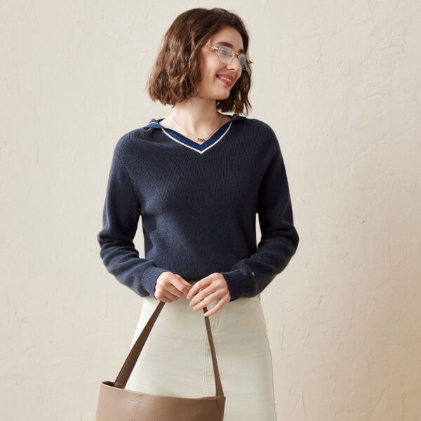 Elevate your casual wardrobe with this timeless hooded pullover sweater. Crafted from high-quality