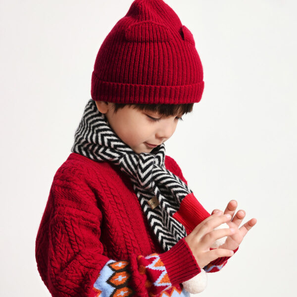 Stay cozy and stylish this winter with our Classic Ribbed Knit Beanie. Available in a variety of colors