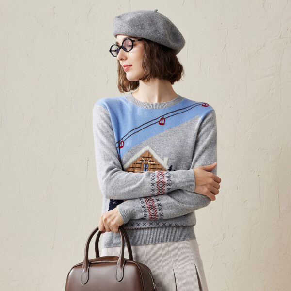 Wrap yourself in warmth and style with our Cozy Cabin Scene Cashmere Sweater