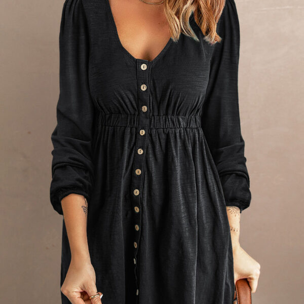  Rock the streets with this cute button up dress! Showcasing a scoop neckline