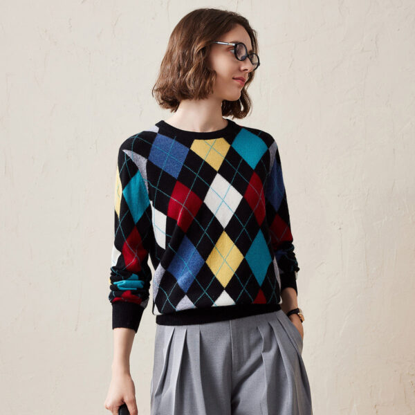 Add a vibrant touch to your wardrobe with this eye catching Women's Argyle Pattern Knitted Sweater. The classic argyle design meets playful