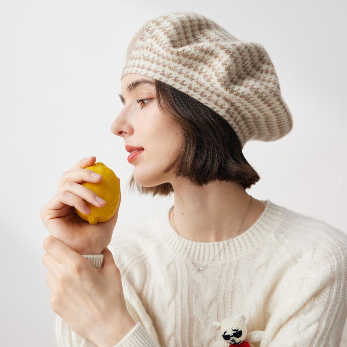 Upgrade your wardrobe with our Elegant Houndstooth Knit Beret