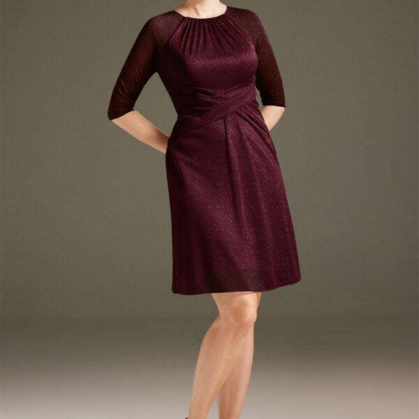 AW Nettie dress is an impeccable knee-length dress filled with cherished details that extols a mother in beauty and pride. This glitter mesh dress radiates a classy allure that evokes a sense of awe with its ruched bodice and keyhole back. It blends a jew