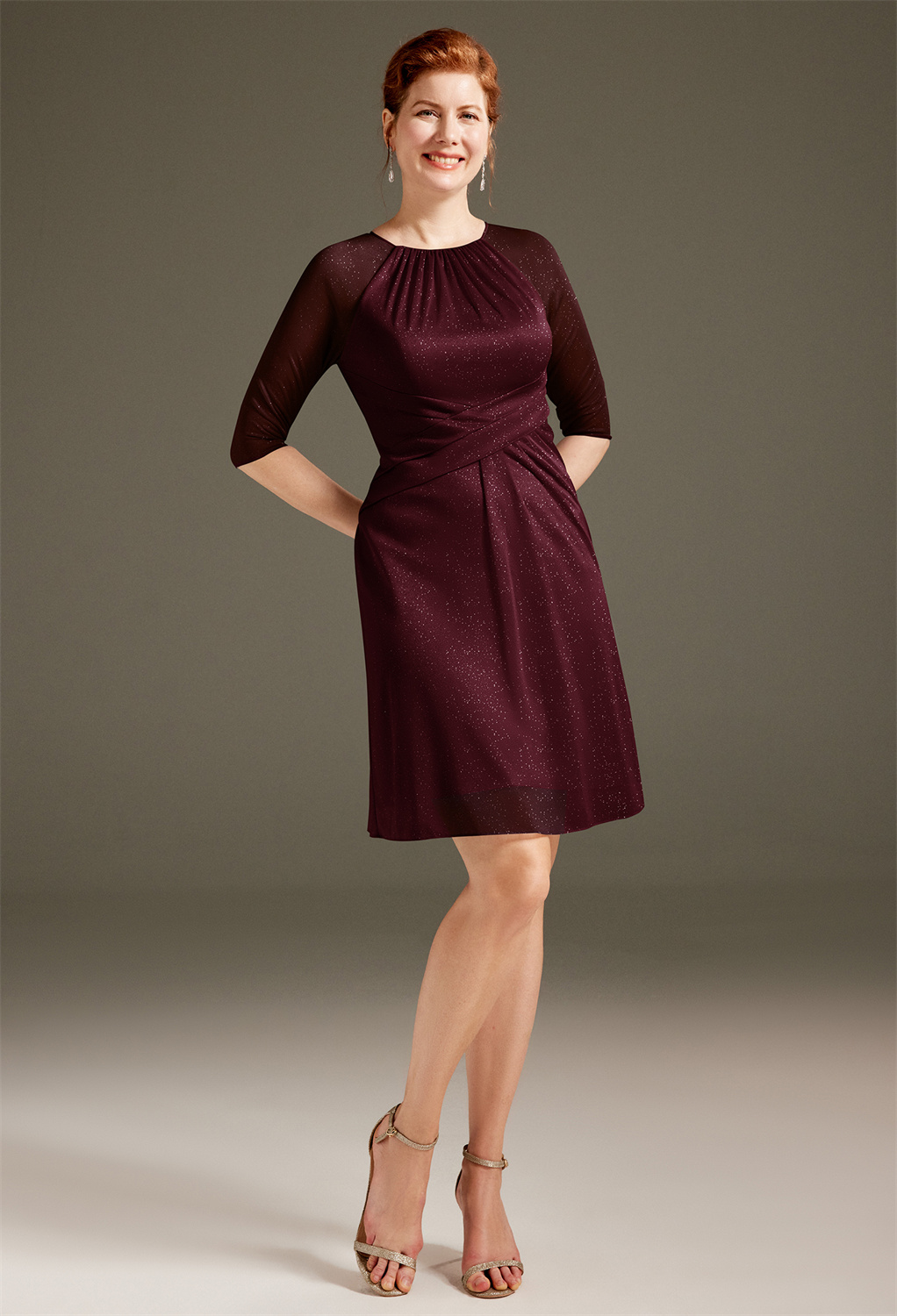 AW Nettie dress is an impeccable knee-length dress filled with cherished details that extols a mother in beauty and pride. This glitter mesh dress radiates a classy allure that evokes a sense of awe with its ruched bodice and keyhole back. It blends a jew