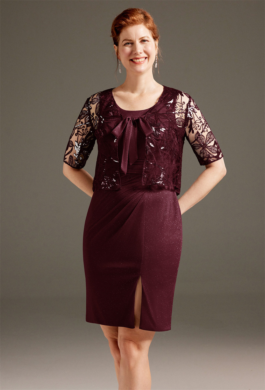 AW Glenna excellently explore modern classy designs with an elegant aesthetics for a chic mom. This knee-length dress is crafted from exquisite glitter mesh. It begins with a jewel neckline sweetly designed on a sleeveless bodice. Its ruched waistline flo