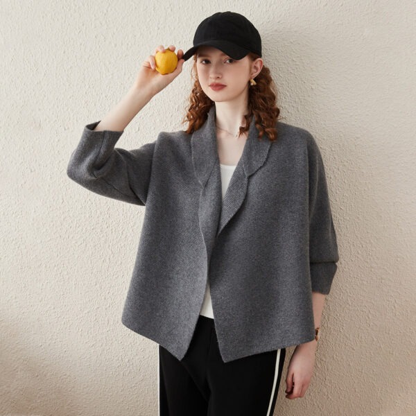 Fabric:100% Wool Blazer Collar:This cardigan features a structured blazer collar that adds a touch of sharpness and enhances your presence