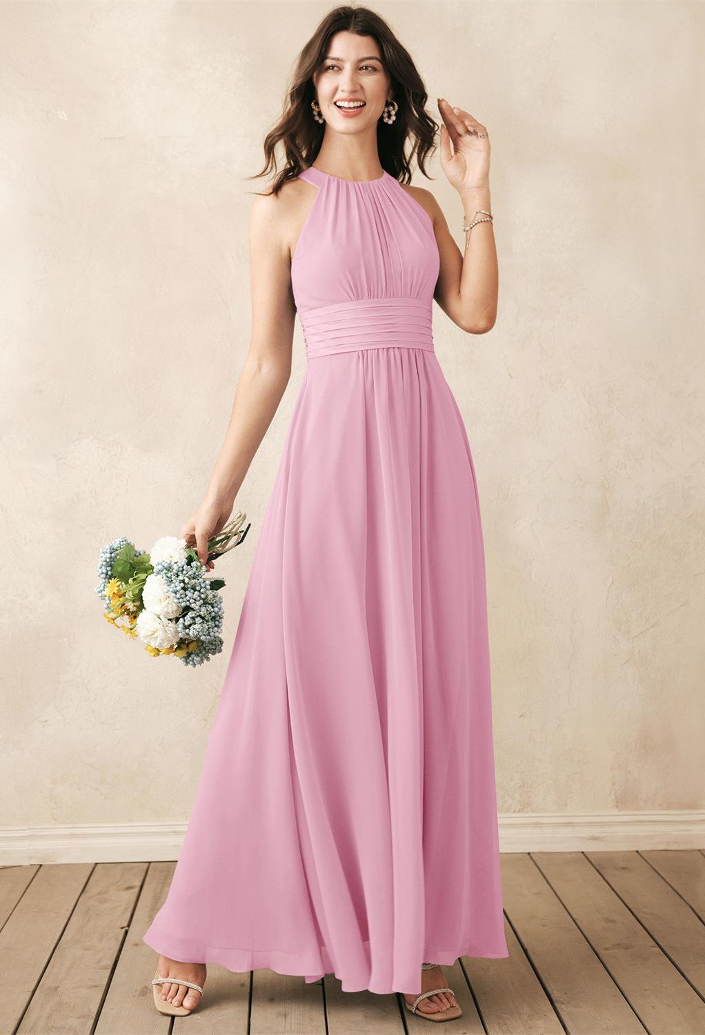 with a bib neckline and plenty of pretty pleats. This floor length gown is made from the prettiest chiffon