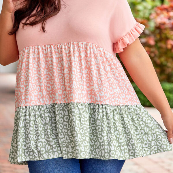 This plus size top is adorably charming with the added ruffle feature. Its relaxed and cozy fit is perfect for all body types