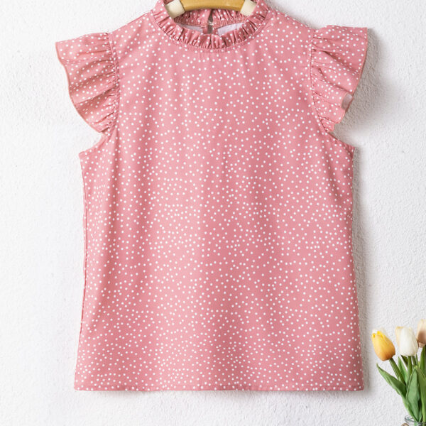 This trendy blouse perfectly complements any bottoms