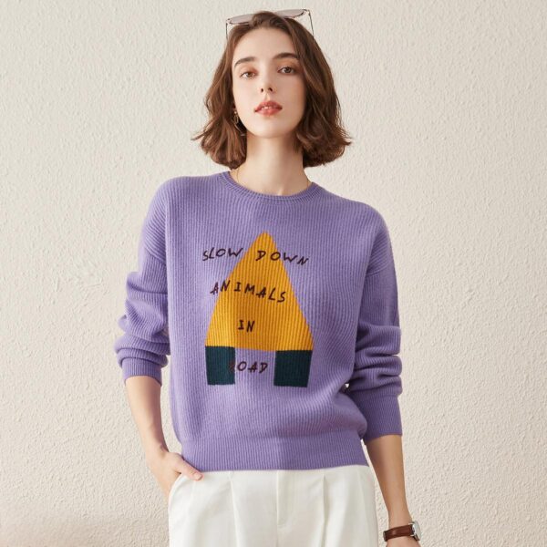 This cashmere knit sweater is the perfect blend of comfort and playful design. Crafted from soft