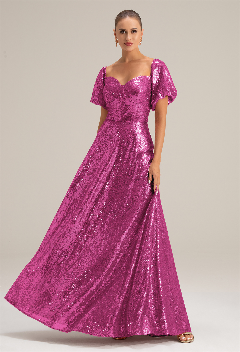 the A-line floor-length bridesmaid dress adorned in sequined material is stylish. The sweetheart neckline ensures you'll sparkle.