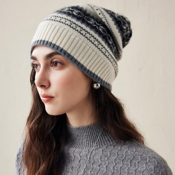 Stay warm and stylish this winter with our Nordic Knit Beanie. Featuring a classic Nordic pattern