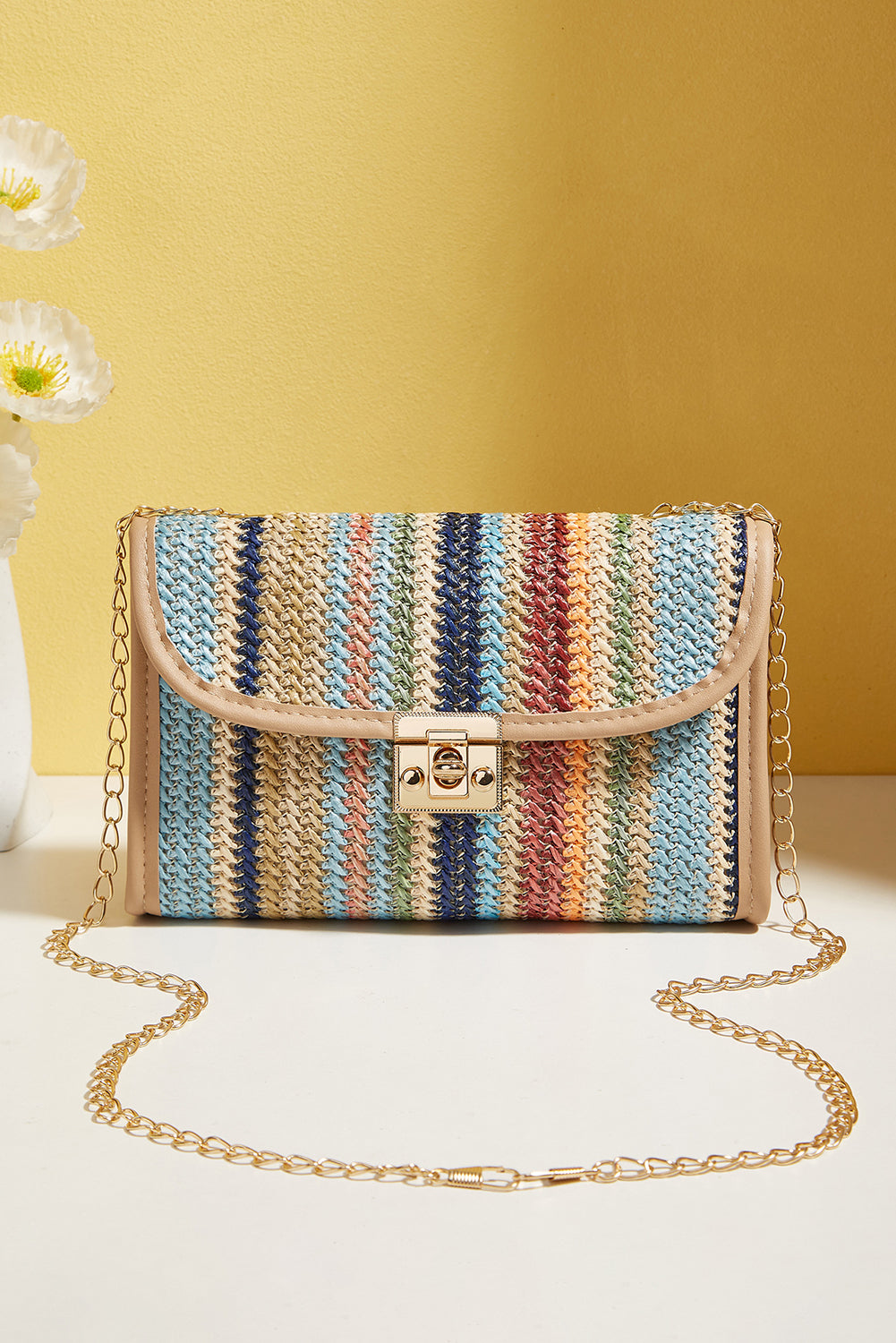 A snazzy and hip striped crochet patternSnug and dependable flapped fasteningSmall and sleek dimensions of 8*2.5*5.5in for easy carrying Top-notch PU leather for long-lasting use