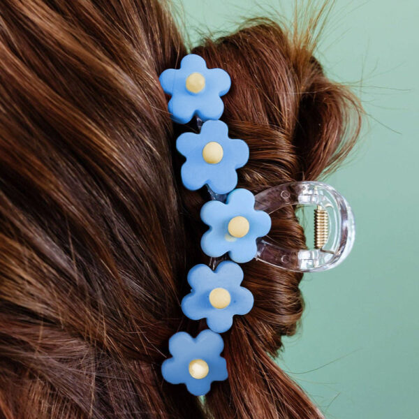 This trendy hair claw is selling like hotcakes! Bursting with bright and vibrant flowers