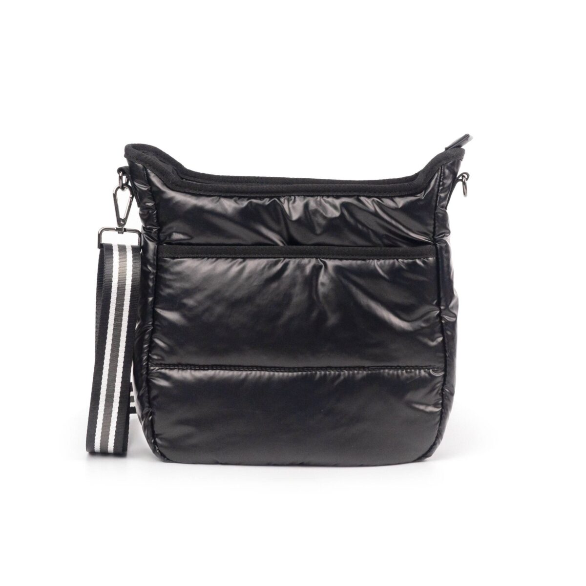 ​Now you can have the perfect puffy bag! Our beautiful puffy messenger from Threaded Pear is the perfect take anywhere bag. This stunning bag features a spacious interior for all your must-have essentials and the exterior pocket is closed by a magnetic