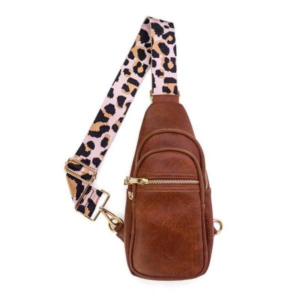 PRODUCT DESCRIPTIONNow you can build your perfect bag! Pick your favorite color Sling bag and then pick your favorite style strap to build the perfect bag. All straps are interchangeable!Our Riley vegan leather sling from the Threaded Pear is the perf