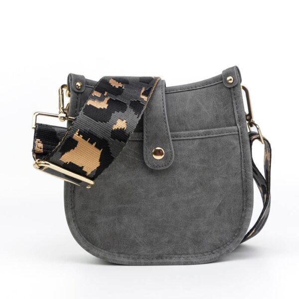 Now you can build your perfect bag! Pick your favorite color Vintage bag and then pick your favorite style strap to build the perfect bag. All straps are interchangeable!Our best selling vintage vegan leather courier now comes in a compact size perfect f