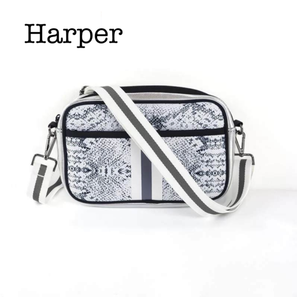 PRODUCT DESCRIPTIONThis adorable yet very functional compact crossbody is the perfect bag when zipping around town
