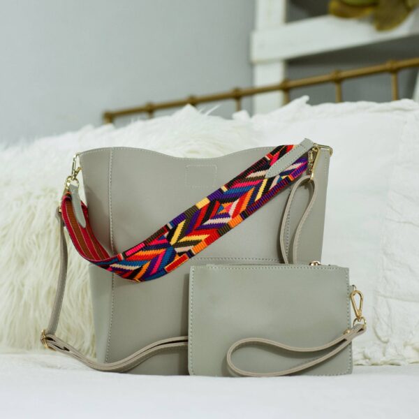 Our beautiful handbag and matching wristlet from the Threaded Pear is the perfect take anywhere bag. This stunning handbag features a spacious interior for all your must-have essentials and exterior pockets to quickly and easily access your items on the g
