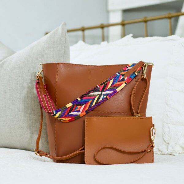 Now you can build your perfect bag! Pick your favorite color vegan leather bag and then pick your favorite style strap to build the perfect bag for you. All straps are interchangeable