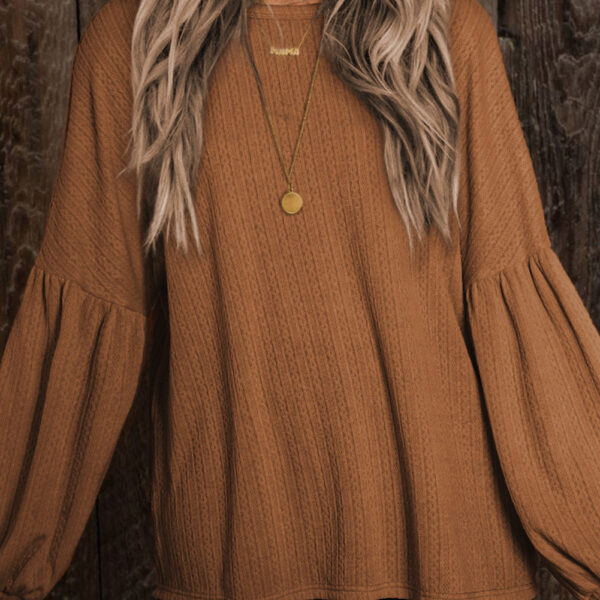 This long sleeve top will quickly become one of your favorite tops to wearThis is a boho closet essential popular with women of different agesMade of soft and cozy fabric with delicate jacquard in a faux knit patternIt features a classic crew neck