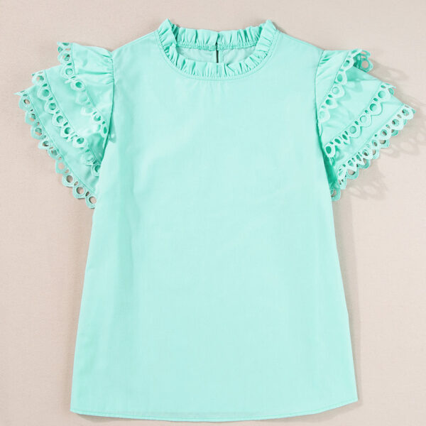 This blouse is perfect for adding versatility and sophistication to your wardrobe. With its frilled neckline