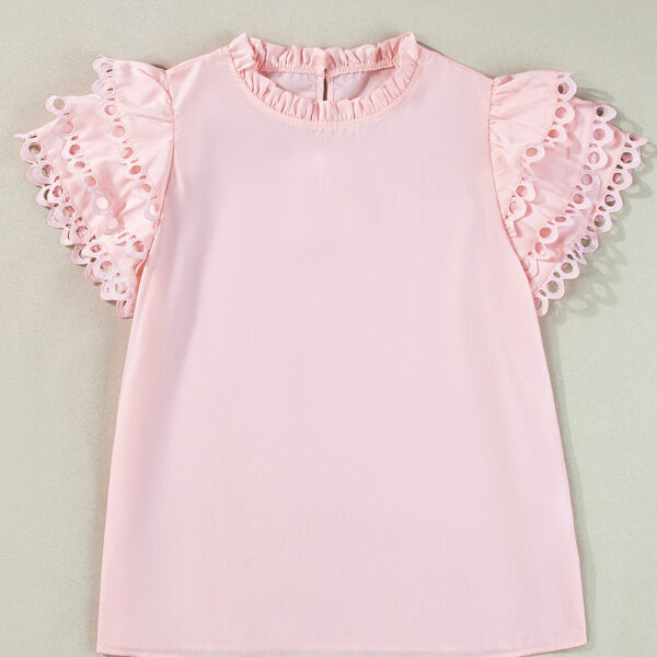 This blouse is perfect for adding versatility and sophistication to your wardrobe. With its frilled neckline