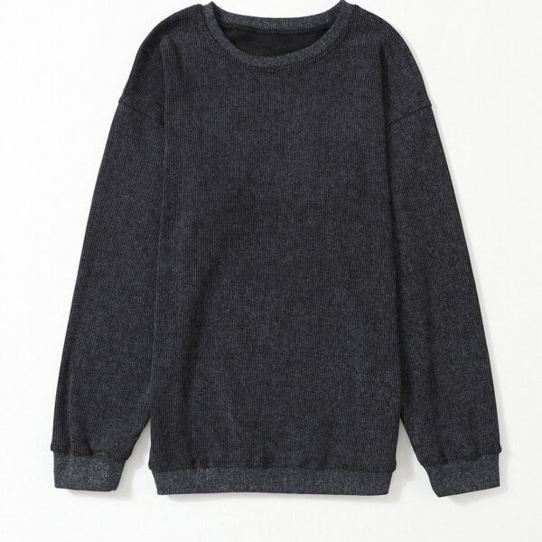 Make a bold fashion statement with this solid round-neck sweatshirt featuring long sleeves and a relaxed fit. The ribbed knit adds texture and prevents it from being mundane. It's perfect for mixing and matching with jeans