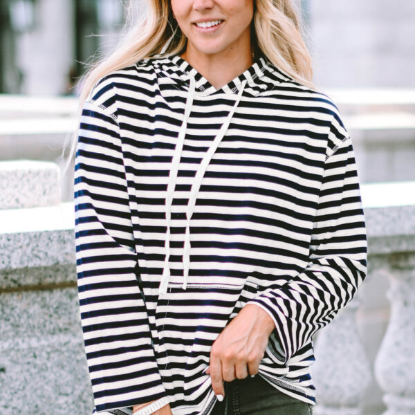 Stay trendy all year long with this Julia Stripe Kangaroo Pocket Drawstring Hoodie. Its classic striped print never goes out of style