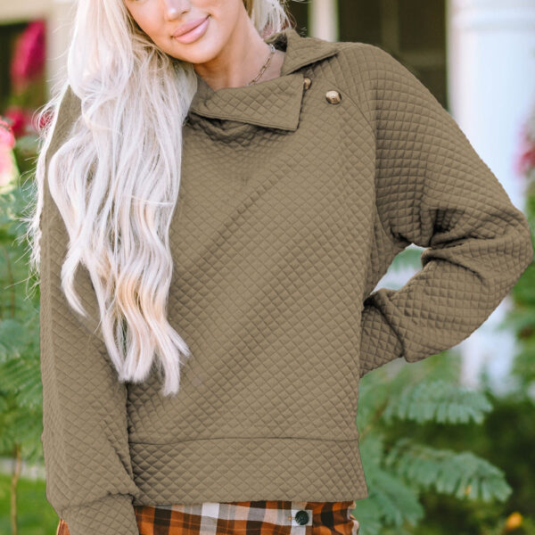 This casual sweatshirt is perfect for layering or wearing on their ownElevate your style with the timeless appeal of a solid colorExperience cozy warmth with the quilted designThe stand neck design adds a touch of uniqueness to your outfit