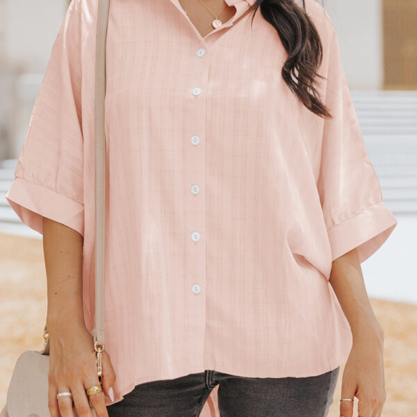 This Paula shirt boasts dolman sleeves that add a unique and stylish touch